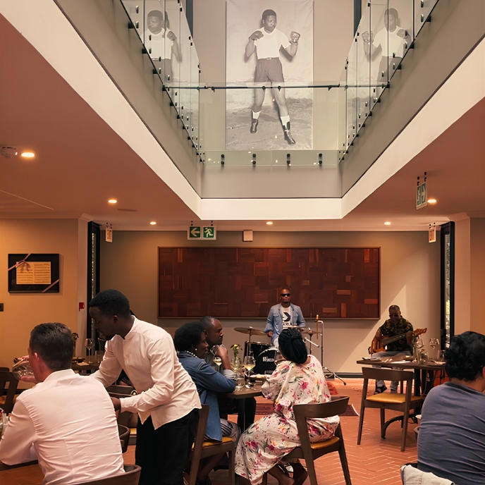 Guests enjoying a meal and jazz at sanctuary mandelas jazz sunday experience