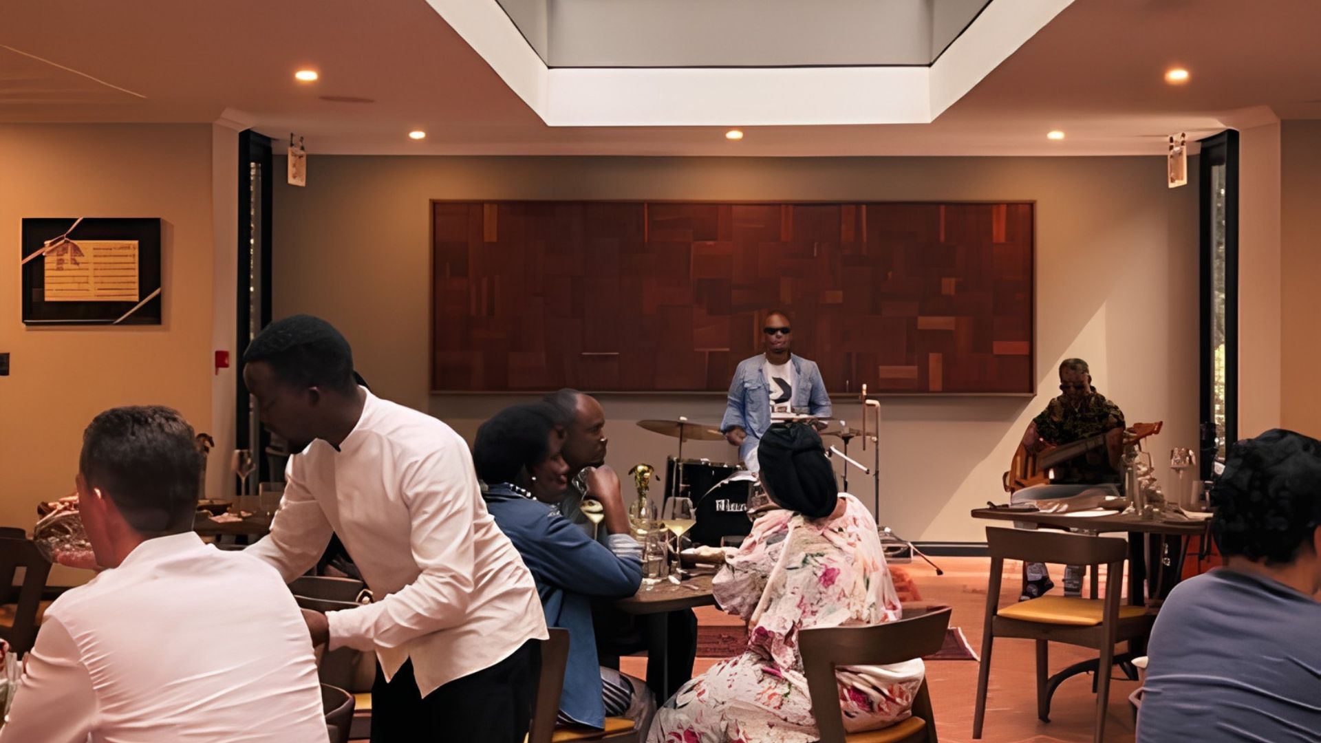 A jazz band playing in the background while patrons dine at Sanctuary Mandela
