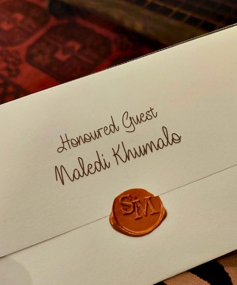 Personalised menu with guest name in Madiba inspired font